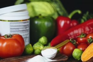 Collagen Protein Supplement Powder and Vegetables