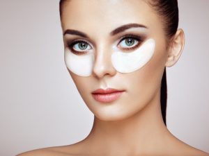 Portrait of Beauty woman with eye patches
